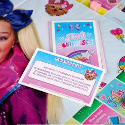 MONOPOLY®: JoJo Siwa -Game Sale Store JoJo Siwa MN photo Siwa Surprises square