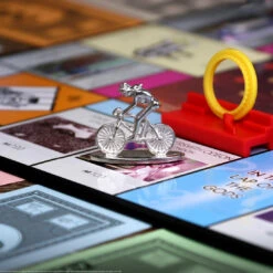 MONOPOLY®: Queen -Game Sale Store Queen Monopoly photo Token Detail Bike square